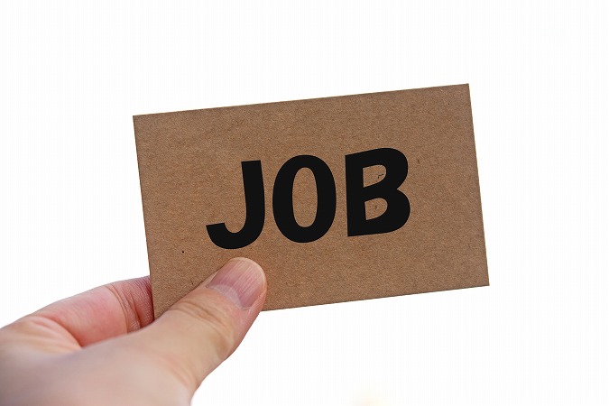 JOBの文字を持つ手